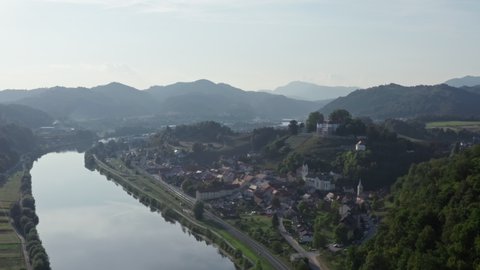 Aerial view Novo-Mesto slovenia. cityscape of the old town with historic buildings by the river and the castle on the mountain.