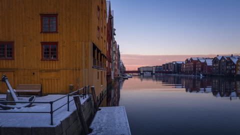 Colorful Houses Reflecting On The Waters Of Nidelva River In Trondheim, Norway At Dusk. hyperlapse