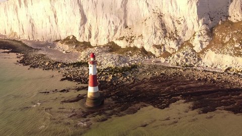 EASTBOURNE, UNITED KINGDOM - Nov 03, 2021: A 4K of beachy head lighthouse at low tide from above 