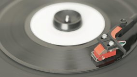 Closeup of vintage record player while playing a seven inch vinyl record. Realtime video