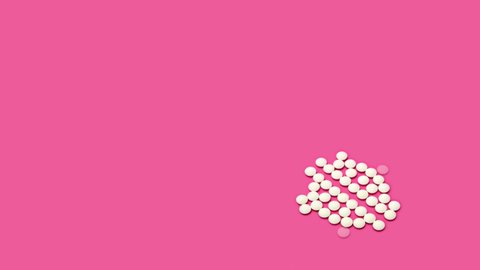  4K Stop motion animation of white pill on Pacific Pink  background. Banner, mockup, space for text, copyspace, Motion Design.  Pharmacy symbol, medicine symbol. Seamless background, seamless loop.