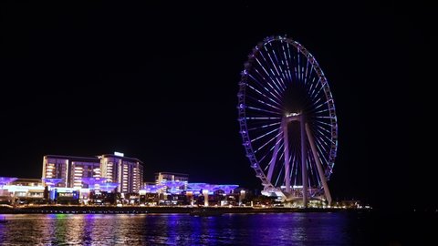 Dubai , United Arab Emirates - 01 11 2022: Light show on Ain Dubai at night, tallest ferris wheel in the world located on blue water island