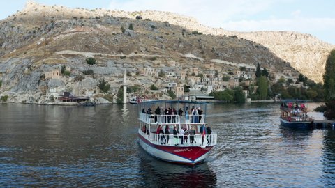 Halfeti , Turkey - 11 03 2021: Tourists On Ferry Boat Leaving The Old Halfeti With Sunken Mosque