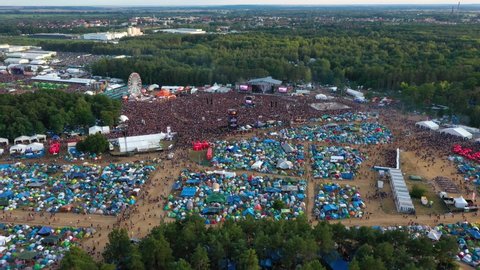 Gdynia , Poland - 06 30 2021: Aerial view of a open air festival, summer day in Poland - tracking, drone shot