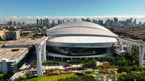Miami, FL, USA - January 31, 2022: Aerial orbit Loandepot Park Miami sports stadium with view of downtown