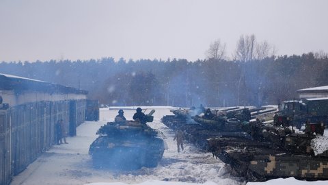 Kharkiv, Ukraine - January, 31, 2022: Tanks with tankers turn around and go to the training ground
