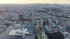 Inscription on video. Oslo, Norway. View overlooking the town. Sunset. Aerial view. Glitch effect text, Aerial View