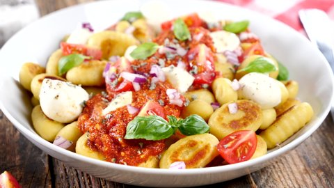 bowl with gnocchi and tomato sauce