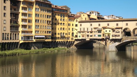 Florence, Italy - June 04, 2021: panning of tourists in Ponte Vecchio