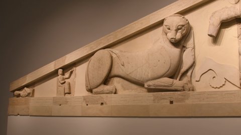 The stone pediment of Artemis Gorgon, originating from the temple of the Goddess Artemis in the Archeological Museum of Corfu Kerkyra, Greece, Ionian Islands