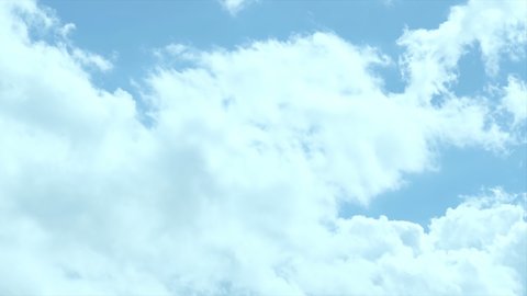 Time lapse clouds in blue sky, fast moving, sunny weather motion, Seamless Loopable, Towering Cumulus Billows, Loop features puffy white fly over a deep blue skies. 4K.