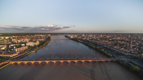 Stone Bridge, Track In, Sunset, Establishing Aerial View Shot of Bordeaux Fr, world capital of wine, Nouvelle-Aquitaine, France