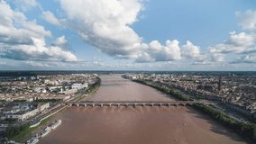 Beautiful Day, Push in, Stone Bridge, Establishing Aerial View Shot of Bordeaux Fr, world capital of wine, Nouvelle-Aquitaine, France