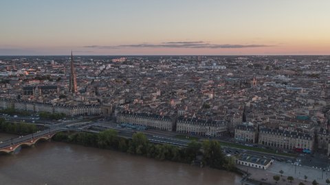 Late sunset colors, old town, Establishing Aerial View Shot of Bordeaux Fr, world capital of wine, Nouvelle-Aquitaine, France