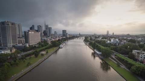 Hazy, Foggy, Cloudy, Establishing Aerial View Shot of Frankfurt am Main De, financial capital of Europe, Hesse, Germany, track into the clouds