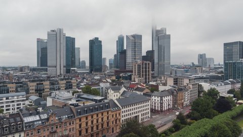 Hazy, Foggy, Cloudy, Establishing Aerial View Shot of Frankfurt am Main De, financial capital of Europe, Hesse, Germany, track along modern part