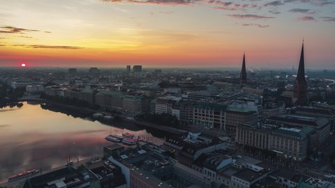 Hamburg, Germany - circa 2021 - Moment sun rises, super light, Establishing Aerial View Shot of Hamburg De, Mecklenburg-Western Pomerania, Germany