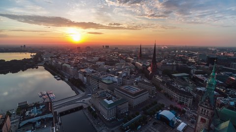 Stellar Sunrise, Port City, push in, towers of historic churches, Establishing Aerial View Shot of Hamburg De, Mecklenburg-Western Pomerania, Germany