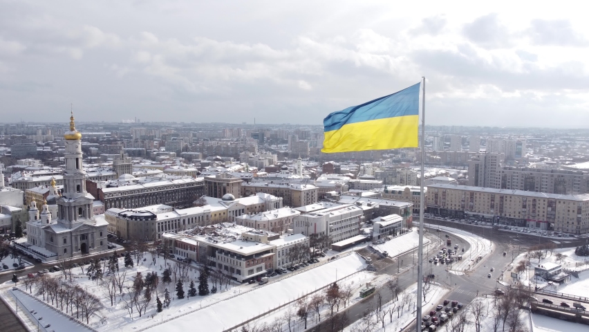 Ukrainian flag in the wind. Blue Yellow flag in the city of Kharkov	 Royalty-Free Stock Footage #1086332912