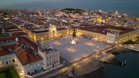 Timelapse of the palace square in Lisbon at night. Top view of the trade Lisbon square in city lights. Night life on the streets of Lisbon, Portugal. Sales square near the marina bay