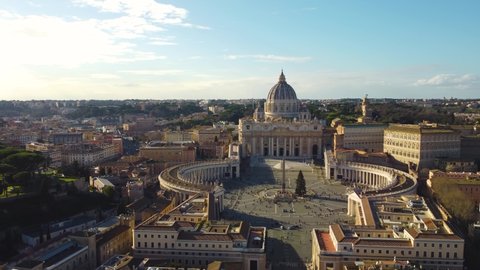 Aerial view of St Peter's Basilica in Vatican City within the city of Rome, Italy. Papal Basilica of Saint Peter in the Vatican, religious building and tourist attraction seen from drone flying in sky