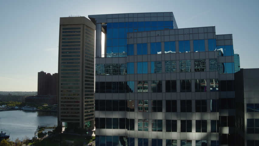 Aerial Shot Of Apartments In Tall Modern Buildings Near River Water - Baltimore, Maryland