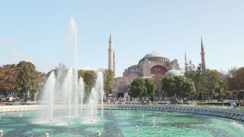 Awesome view of scenic fountain at the Sultanahmet Square and the Hagia Sophia in Istanbul, Turkey. The Sultanahmet Square is a popular tourist attraction of the world.