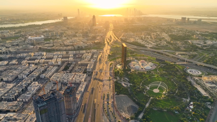 Sunrise view of Dubai city futuristic skyline showcasing Dubai frame shining in gold  Royalty-Free Stock Footage #1086363098