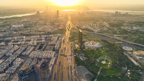 Sunrise view of Dubai city futuristic skyline showcasing Dubai frame shining in gold 
