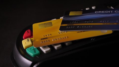 Credit card machine for payment transactions. This video is about Business, Finance, money, card payment, online transactions, dollar, Credit Card, and debit cards.