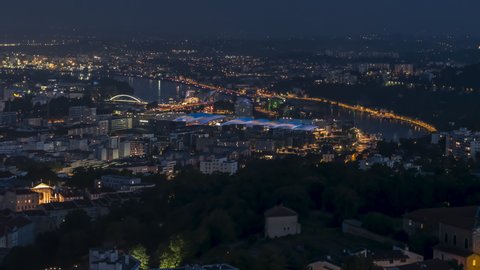 2nd arrondissement of Lyon, Establishing Aerial View Shot of Lyon Fr, Auvergne-Rhone-Alpes, France at night evening