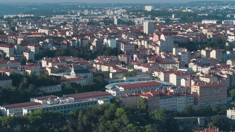 Lyon, France - circa 2021 - Establishing Aerial View Shot of Lyon Fr, Auvergne-Rhone-Alpes, France, day, track right along Les Chartreux