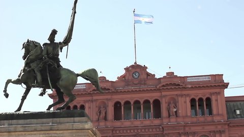 Casa Rosada (Pink House) with the Bronze Statue of General Belgrano, in Plaza de Mayo, Buenos Aires, Argentina. 4K Resolution.