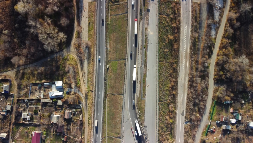 a large automobile bridge over the river from a bird