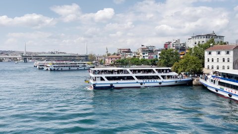 Istanbul, Turkey - August 22, 2021; Many ferryboats floating on the Bosphorus river