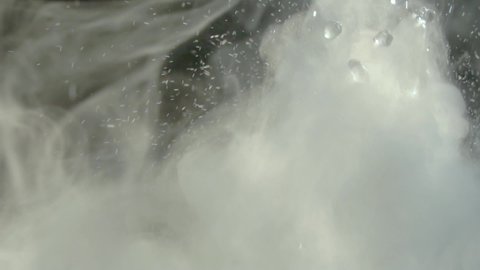 
Abstract smoke moves on a black background. Fog formation. Chemical experience in the laboratory.  Space fog. Equalizer, video effect. Alchemy.  Meditation, reflection, inspiration. Intro, outro