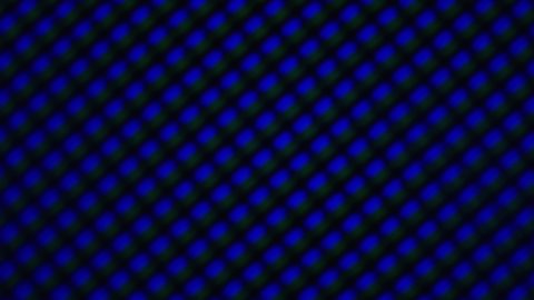 LCD screen pixels under a microscope. Macro Shot Of Matrix Screen, Pixels Texture. Video Background. LED Display With RGB Color Shades technology. Close Up Monitor. Technology Pattern