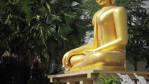 Golden Buddah Statue in Temple of Thailand,With a Beautiful Art in Sunny Day