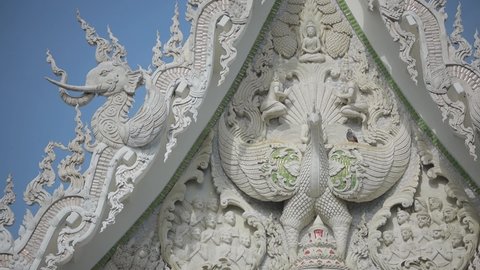 White Holy Elephant and Garuda Pattern on Church Roof in Temple of Thailand,With a Beautiful Art in Sunny Day