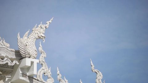White Holy Statue Naga Religion Pattern in Temple of Thailand,With a Beautiful Art in Sunny Day