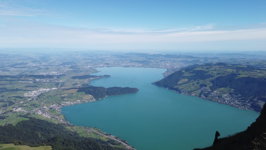 Panoramic views along hiking trail around Rigi Kulm, the highest peak on Mount Rigi over 13 lakes and peaks of the Swiss Alps. Canton of Lucerne, Central Switzerland.