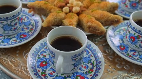 Turkish coffee and baklava on the table. Selective focus.