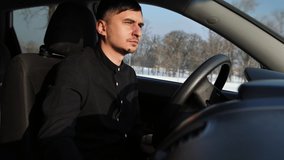 A businessman shaves in a car behind the wheel. A man shaving in the driver's seat. - Powered by Shutterstock - Get 15% off with code: PIKWIZARD15