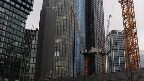 frankfurt, hesse, germany - 19 01 2022: a skyscraper construction site in frankfurt am main germany 30fps