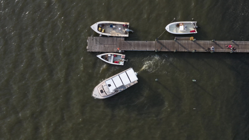 Boat heading out from a dock