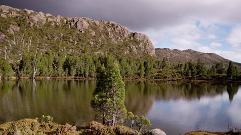 a sunset pan of the pool of siloam, zion hill and solomon's throne at walls of jerusalem national park in tasmania, australia