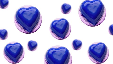 Animated Heart shaped mousse cheese cake decorated blue chocolate icing flying and wiggle in in the air on isolated background. Valentines day, Date, Wedding, 8 March, Womens gift. Romantic love 