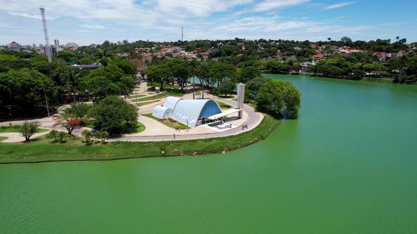 Metropolis aerial view of landmark Pampulha lake and sports centre stadium near amusement park at downtown Belo Horizonte Minas Gerais Brazil. Landmark of city.