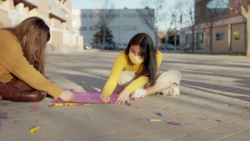 Ecuadorian and transgender woman prepare banners for 8 march feminism protest slow motion  | Shutterstock HD Video #1086426839