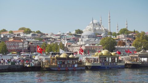 Istanbul, Turkey - September 17, 2021: Amazing view of the Suleymaniye Mosque across the Golden Horn. The Ottoman imperial mosque is a popular destination among tourists and pilgrims in the world.